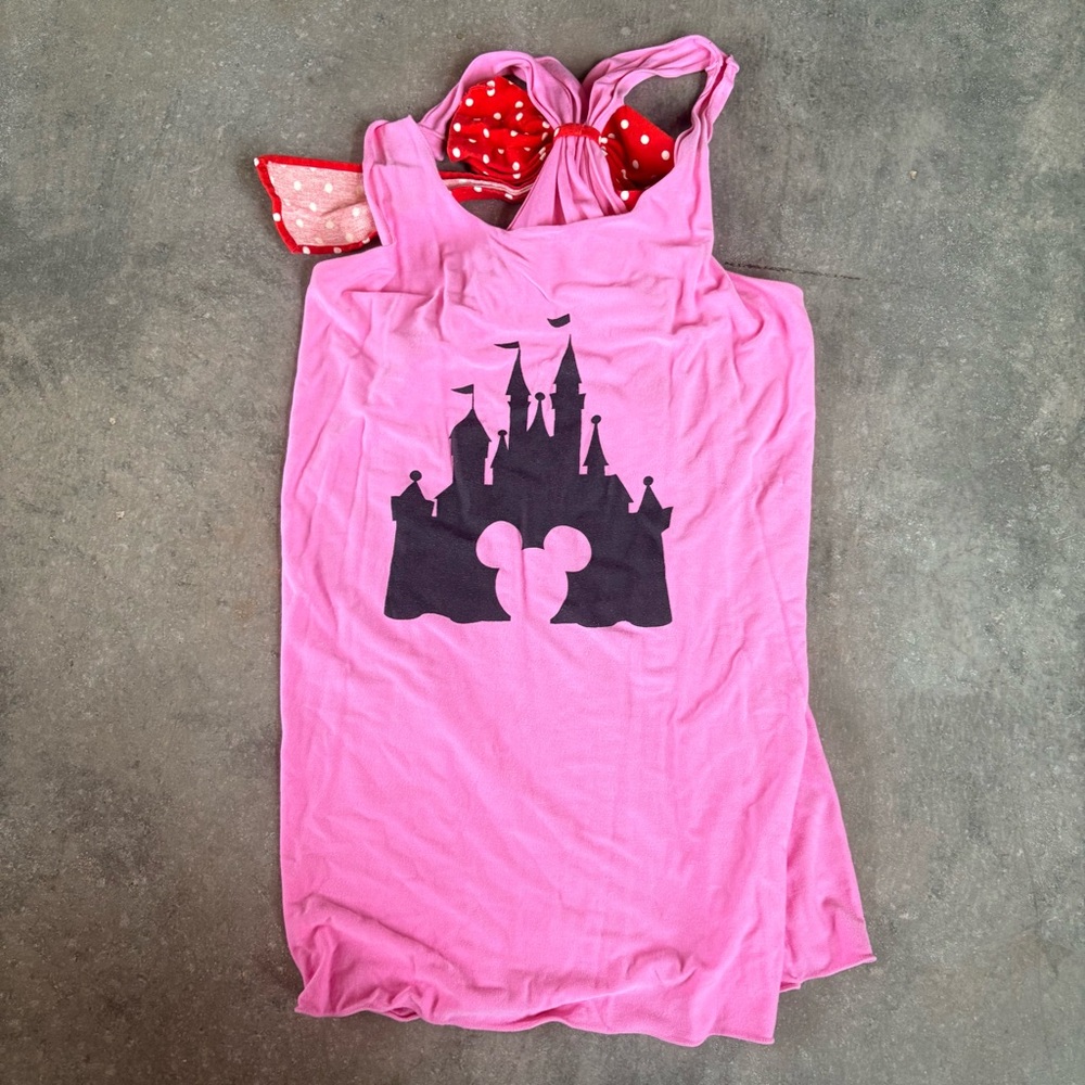 Pink Disney World tank top with red bow. Perfect for a hot park day!